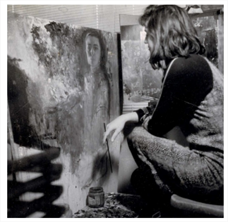 Esther Perez painting in her studio, early in her practice